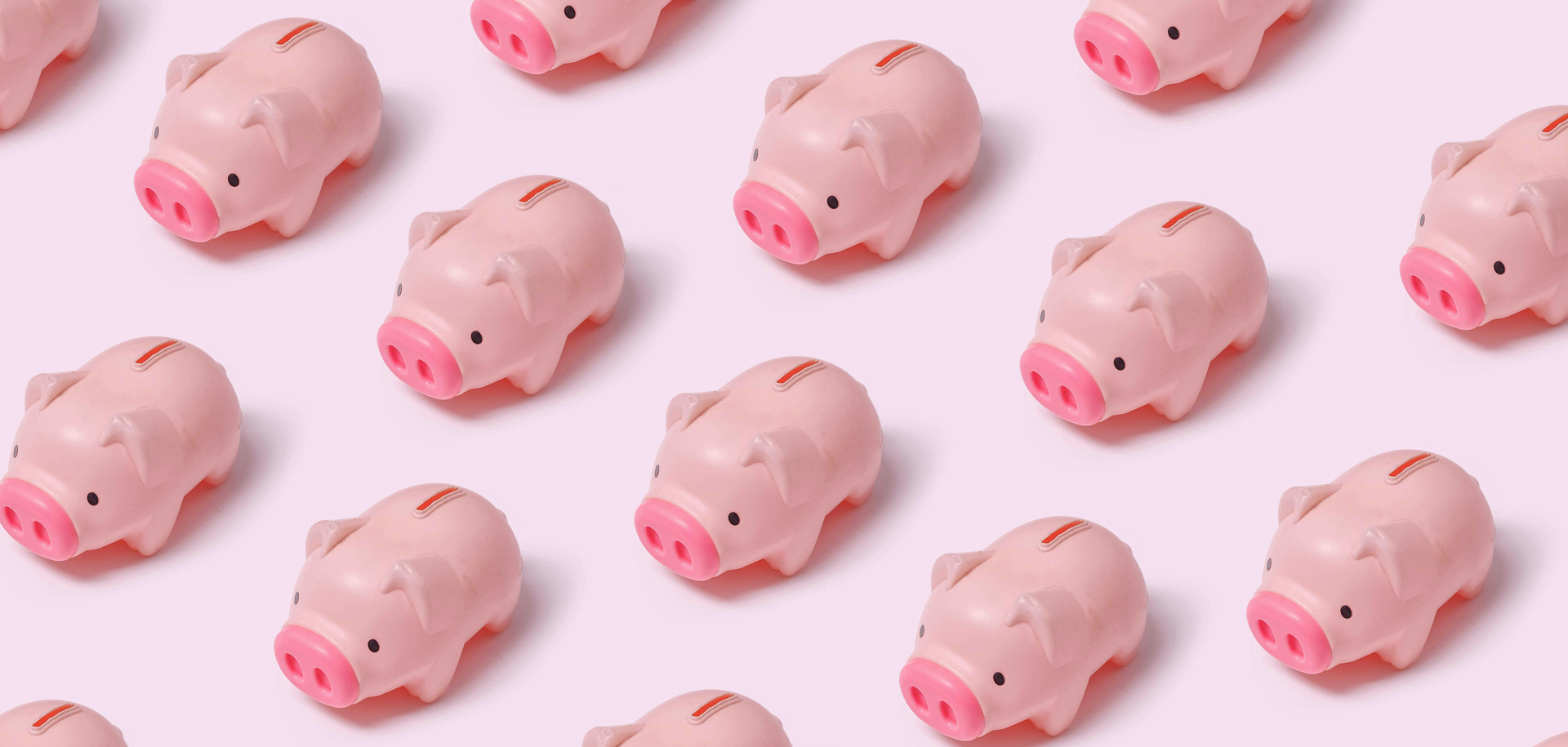 Image if pink piggy banks in a grid pattern